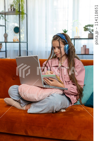 Online education at laptop of child girl at home virtual class, remote lesson distance studying 114118651