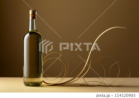 Bottle of white wine. 114120983