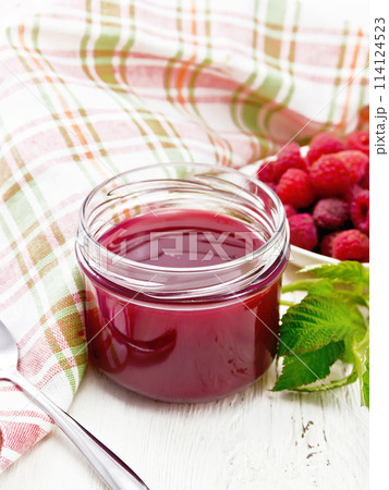 Jam of raspberry in jar on table 114124523