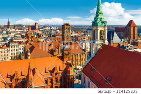 Aerial panoramic view of historical buildings and roofs in Polish medieval town Torun 114125835
