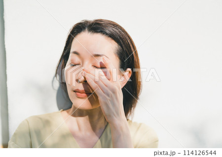 a forty-something woman a forty-something woman 114126544