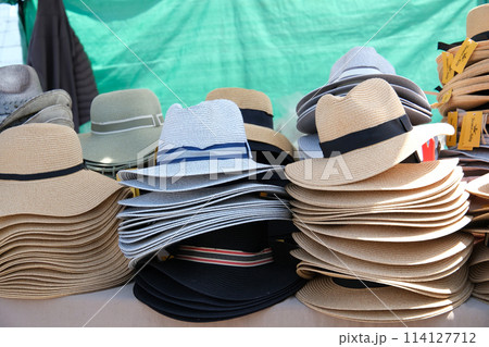 Cloverdale rodeo country fair get back to Country family events Canada Vancouver Surrey buying a hat different hats on the counter gray beige cowboy clothes Cloverdale rodeo country fair get back to Country family events Canada Vancouver Surrey buying a hat different hats on the counter gray beige cowboy clothes 114127712