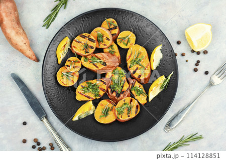 Barbecue, roasted sweet potato. 114128851