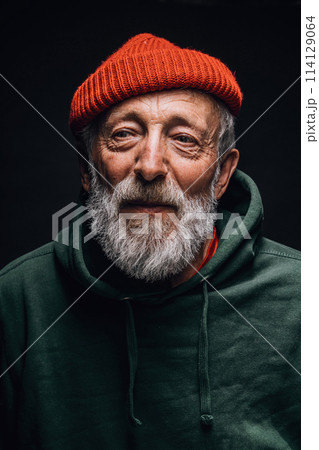 Bearded old man with wrinkled weathered face and tired eyes express positivity. Bearded old man with wrinkled weathered face and tired eyes express positivity. 114129064