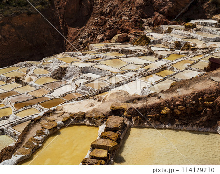 Impressive colors of Maras salt ponds in the sacred valley of Incas, Cusco region, Peru Impressive colors of Maras salt ponds in the sacred valley of Incas, Cusco region, Peru 114129210