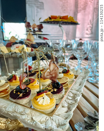 Catering Buffet Table Appetizers and Fruit Platter at Event Catering Buffet Table Appetizers and Fruit Platter at Event 114130255