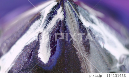Glitter pyramid. Paint drop. Defocused neon blue purple white color glowing shimmering particles texture ink drip geometric abstract art background. 114131488