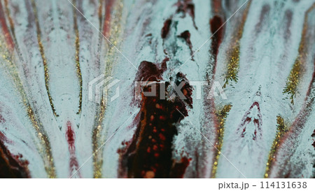 Glitter ink drip. Paint spill. Defocused blue golden red color shimmering particles texture fluid flow fractal abstract art background. 114131638