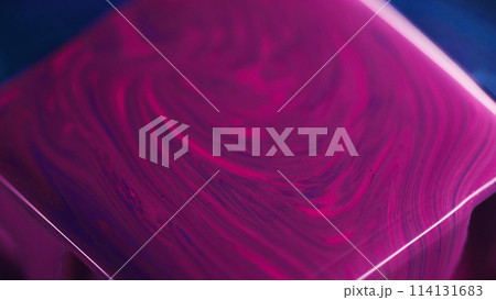 Paint cube. Colorful spill. Defocused vivid pink purple blue pigment smooth emulsion fluid ink blend flow on shiny square shape surface geometric art abstract background. 114131683