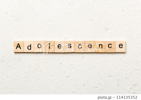 adolescence word written on wood block. adolescence text on table, concept adolescence word written on wood block. adolescence text on table, concept 114135352