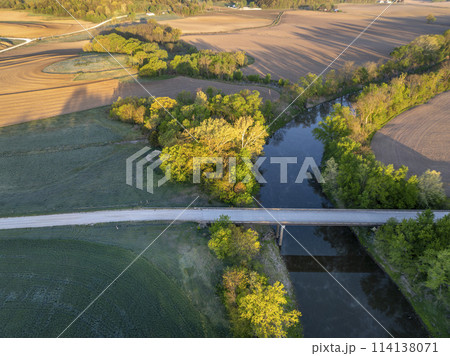 sunrise over farmland and the Lamine River at Roberts Bluff access in Missouri, springtime aerial view 114138071