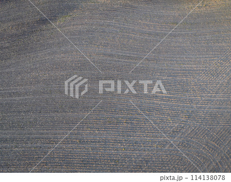 springtime aerial view of plowed corn fields in central Missouri 114138078