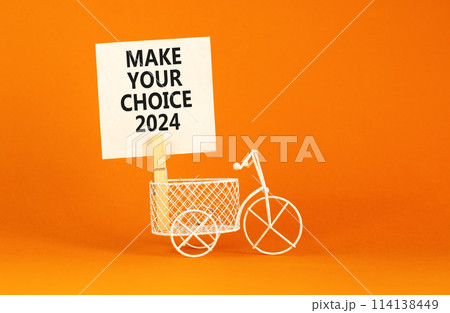 Make your choice 2024 symbol. Concept words Make your choice 2024 on beautiful white paper on clothespin. Bicycle model. Beautiful orange background. Business Make your choice 2024 concept. Copy space Make your choice 2024 symbol. Concept words Make your choice 2024 on beautiful white paper on clothespin. Bicycle model. Beautiful orange background. Business Make your choice 2024 concept. Copy space 114138449