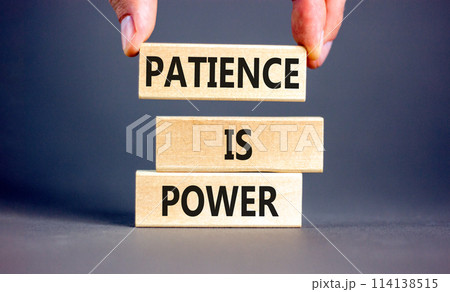 Patience is power symbol. Concept words Patience is power on beautiful wooden blocks. Beautiful grey table grey background. Businessman hand. Business and patience is power concept. Copy space. 114138515