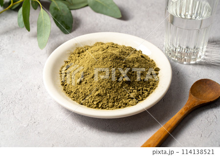 Moringa Matcha Wheatgrass Green Powder. Food supplement, healthy food lifesyle Moringa Matcha Wheatgrass Green Powder. Food supplement, healthy food lifesyle 114138521