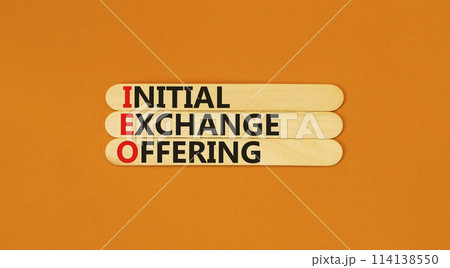 IEO initial exchange offering symbol. Concept words IEO initial exchange offering on beautiful wooden stick. Beautiful orange background. Business IEO initial exchange offering concept. Copy space. 114138550