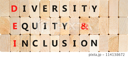 DEI diversity equity and inclusion symbol. Concept words DEI diversity equity and inclusion on blocks on beautiful wooden background. Business DEI diversity equity and inclusion concept. Copy space. 114138672
