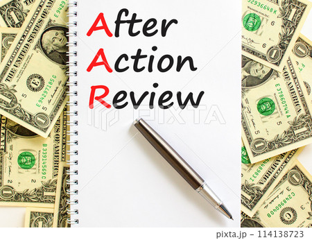 AAR After action review symbol. Concept words AAR After action review on beautiful white note. Dollar bills. Beautiful dollar bills background. Business AAR after action review concept. Copy space. AAR After action review symbol. Concept words AAR After action review on beautiful white note. Dollar bills. Beautiful dollar bills background. Business AAR after action review concept. Copy space. 114138723