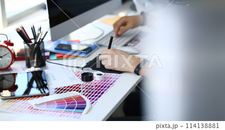 Test print paper page with colour test design fantail and magnifying glass 114138881