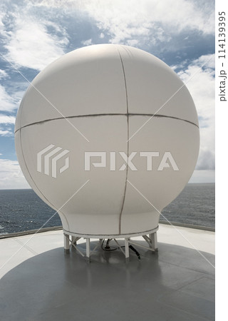Navigational Radar Dome on Ship Against Sky Navigational Radar Dome on Ship Against Sky 114139395