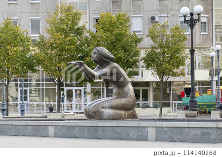 Novorossiysk, Russia - 08.18.2023. Sculpture Giving water and a house with a turret, Black Sea, port, Krasnodar Territory, Novorossiysk 114140268