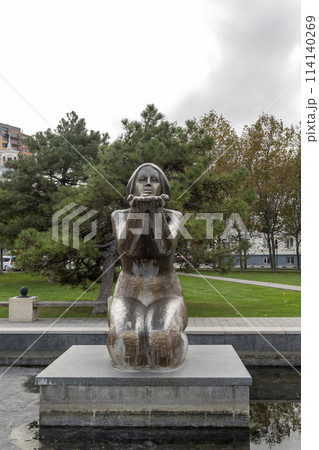 Novorossiysk, Russia - 08.18.2023. Sculpture Giving water and a house with a turret, Black Sea, port, Krasnodar Territory, Novorossiysk Novorossiysk, Russia - 08.18.2023. Sculpture Giving water and a house with a turret, Black Sea, port, Krasnodar Territory, Novorossiysk 114140269