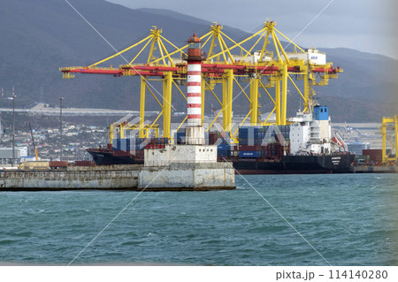 Novorossiysk, Russia 08.18.2023. Port cranes, Black Sea, port, Krasnodar Territory, Novorossiys Novorossiysk, Russia 08.18.2023. Port cranes, Black Sea, port, Krasnodar Territory, Novorossiys 114140280
