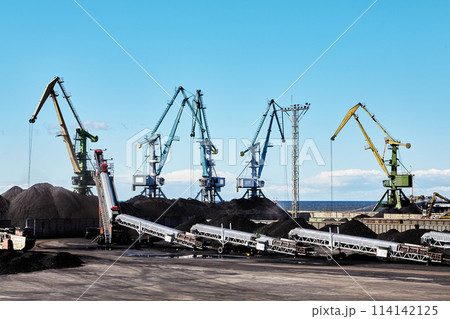 Maritime bulk terminal, mobile stacker conveyors, located one behind other, for processing bulk cargo. Maritime bulk terminal, mobile stacker conveyors, located one behind other, for processing bulk cargo. 114142125