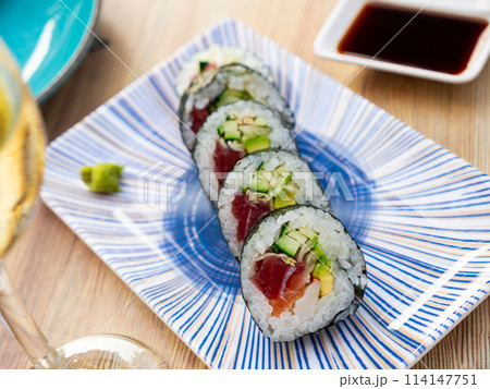 Japanese roll futomaki with soy sauces 114147751
