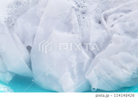 Soak a cloth before washing, white cloth 114148426