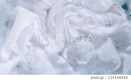 Soak a cloth before washing, white cloth 114148430