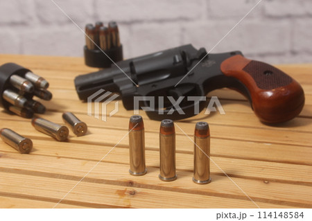 Vintage Revolver Gun With Ammunition and Speed Loader 114148584