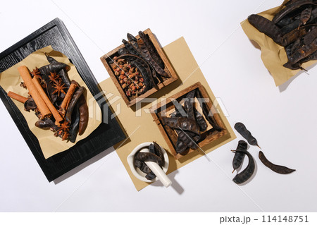 View from above photo with traditional rustic style, most of ingredients displayed on wooden tray and paper. Natural product is currently at the forefront of skincare and beauty research 114148751