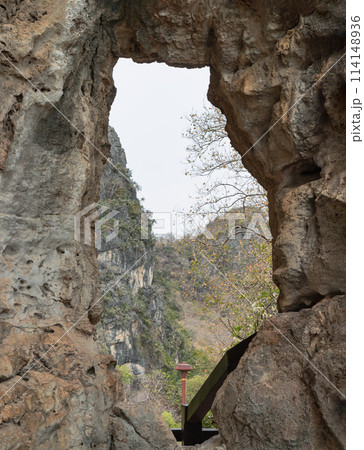 The Phanthurat's Mirror a small natural arch at Khao Nang Phanthurat Forest Park. 114148936