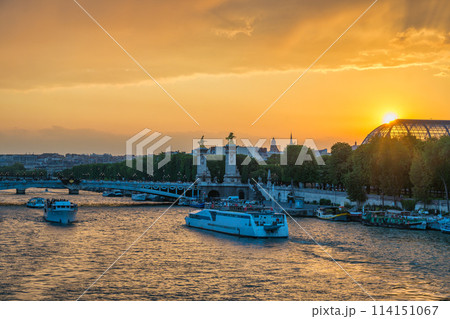 Paris France, city skyline sunset at Seine River with Pont Alexandre III bridge and Grand Palais Paris France, city skyline sunset at Seine River with Pont Alexandre III bridge and Grand Palais 114151067