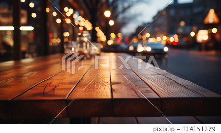 The surface of a wooden table in a cafe restaurant outdoors on a terrace with a blurred background and glowing bokeh lights. AI generated 114151279