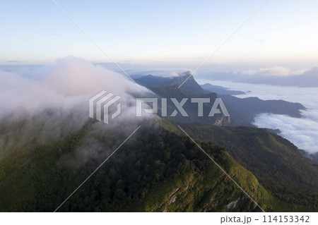 Landscape of Morning Mist with Mountain Layer at north of Thailand. mountain ridge and clouds in rural jungle bush fores Landscape of Morning Mist with Mountain Layer at north of Thailand. mountain ridge and clouds in rural jungle bush fores 114153342