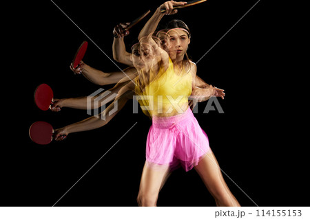 Concentrated young woman in colorful sportswear training, playing table tennis against black background with stroboscope effect Concentrated young woman in colorful sportswear training, playing table tennis against black background with stroboscope effect 114155153