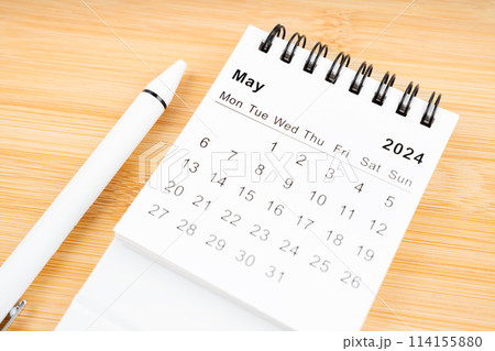 May 2024 Monthly desk calendar for 2024 year with pen. May 2024 Monthly desk calendar for 2024 year with pen. 114155880