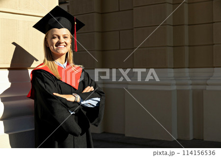 A young girl, a university graduate, in a robe. 114156536