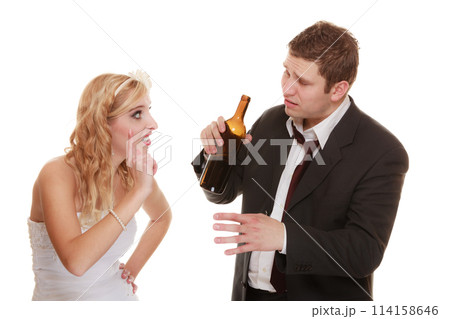 Wedding couple, bride with alcoholic drinking groom. 114158646