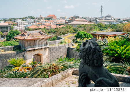 View of Shurijo Castle and Shisa sculpture in Naha, Okinawa, Japan 114158784