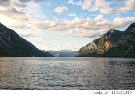 View of Geiranger fjord from the boat, Western fjords, Norway. Hardanger fjord landscape. Scandinavian mountains of Sunnylvsfjorden canyon 114161330