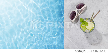 Refreshing cocktail by the pool on a sunny day 114161644