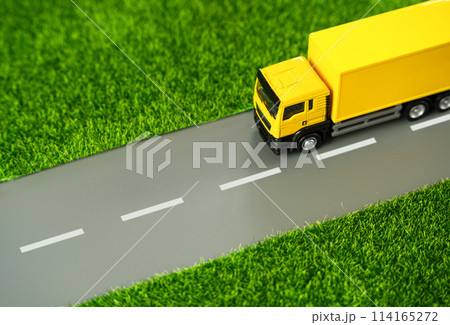 The truck is driving along the road. Logistics and industry. Delivery of online orders and purchases. Supply of goods. 114165272