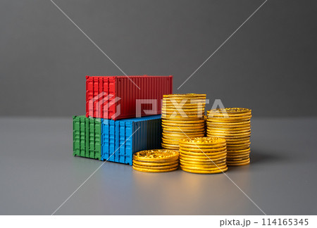 Sea trade containers and a stack of coins. World trade. Prices, tariffs and taxes. Transportation costs. Logistics and transportation of commercial cargo. 114165345