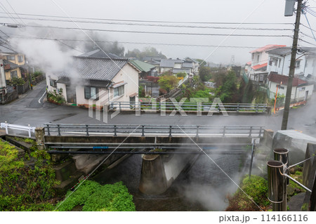 Houses along canal with heavy steam and mist in Beppu, Oita 114166116