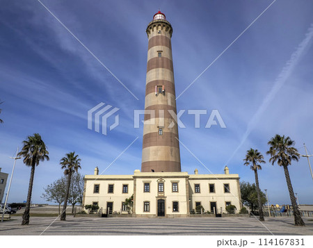 Farol de Aveiro. Lighthouse in the coast of Aveiro, in front of atlantic ocean, biggest of Portugal Farol de Aveiro. Lighthouse in the coast of Aveiro, in front of atlantic ocean, biggest of Portugal 114167831