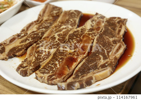 Korean style bbq. Marinated beef ribs 114167961