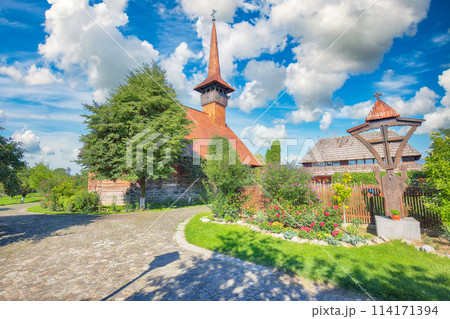 Amazing  summer scene of Iulia Alba town and Old wooden Michael the Brave church 114171394